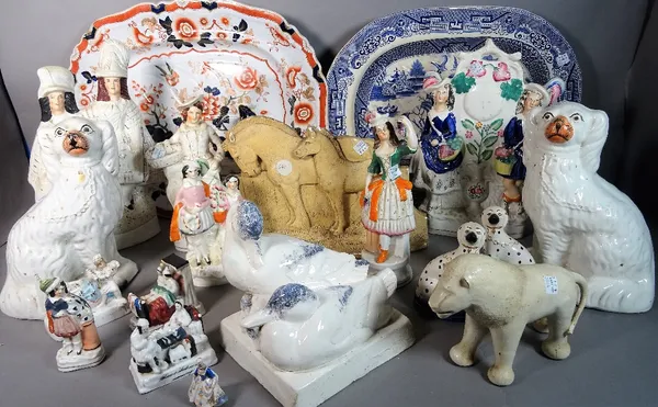 Ceramics including; a pair of Staffordshire flatback figures, a pair of Staffordshire dog figures, an earthenware Art Deco lion and sundry, (qty).