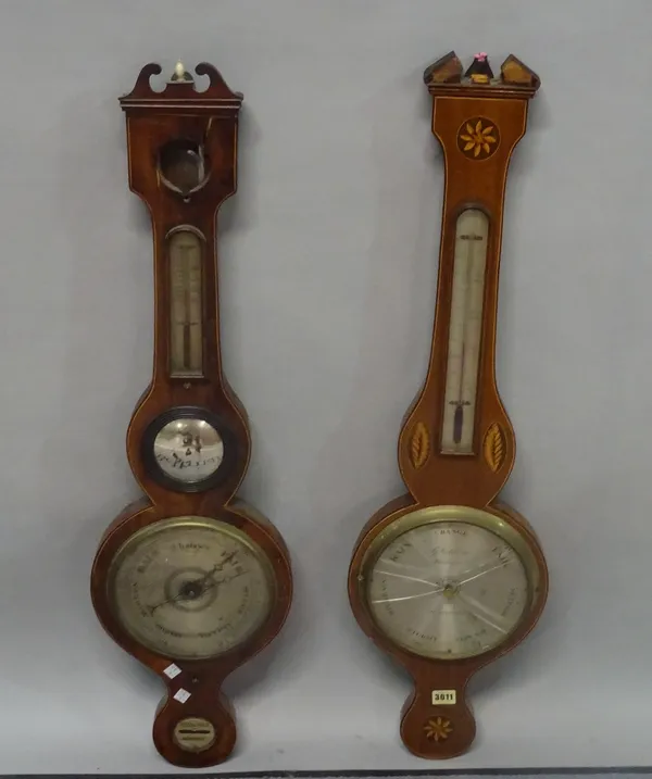 An Edwardian mahogany and inlaid banjo shaped wall barometer, 97cm high, and another similar, 96cm high.