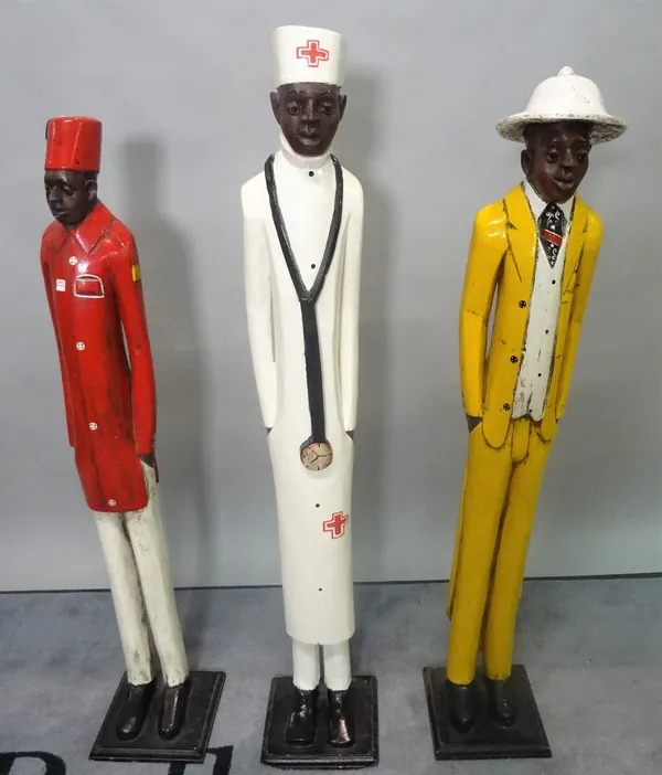 A group of three painted hardwood figures, the tallest 119cm high.