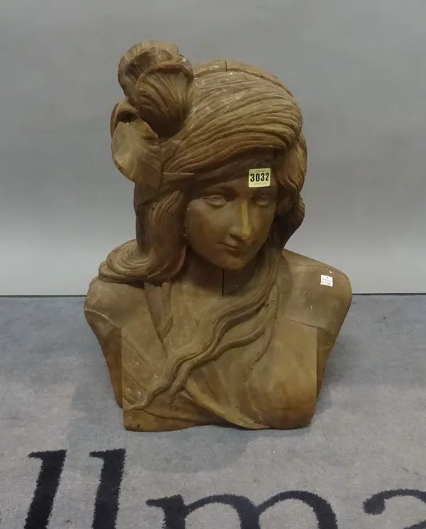 An early 20th century hardwood female bust, 41cm wide x 55cm high.