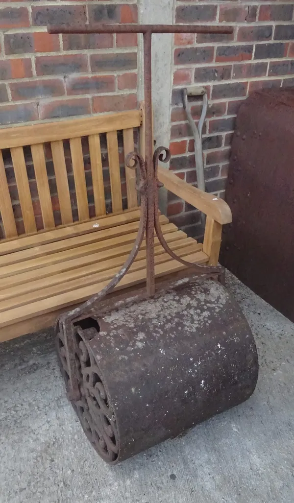 An early 20th century cast and wrought iron garden roller, 60cm wide.