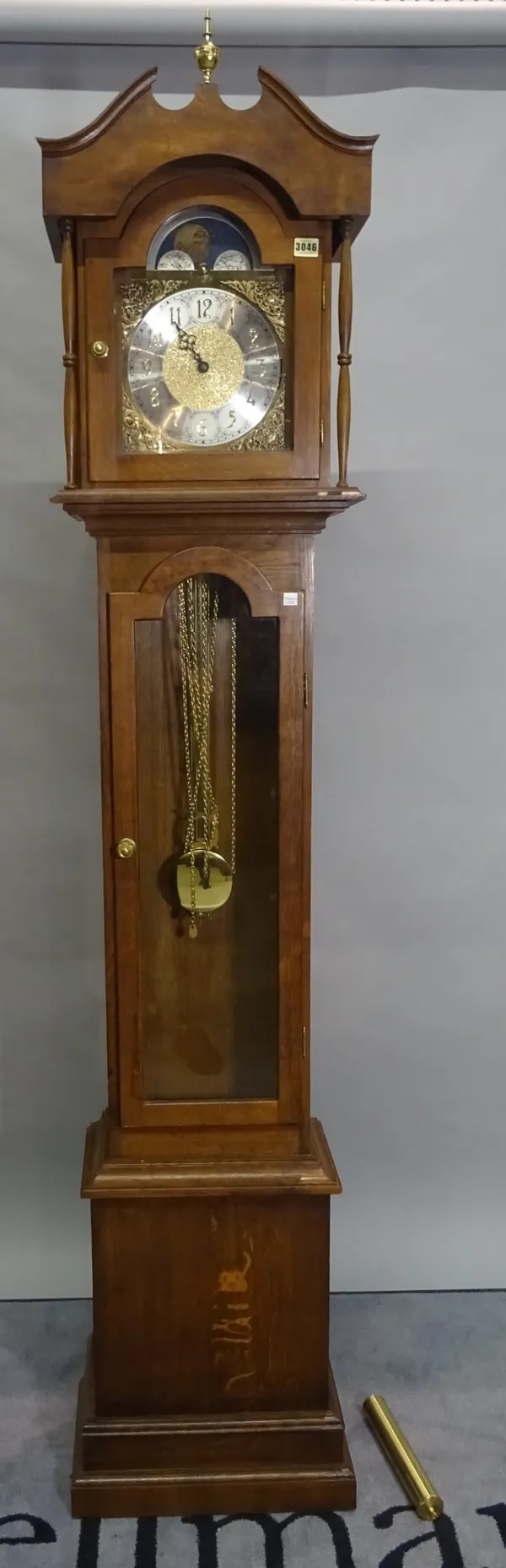 A modern oak longcase clock, one pendulum, three weights, 41cm wide x 209cm high.