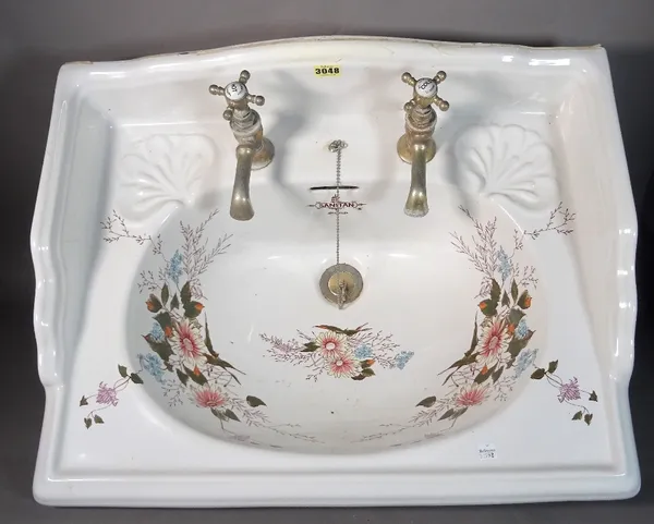 SANITAN, a modern galleried ceramic sink with floral decoration, 63cm wide x 10cm high.