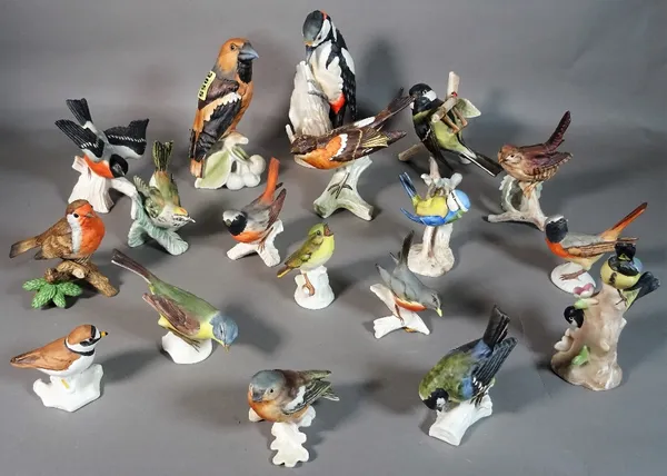 Eighteen Goebel ceramic bird figurines.