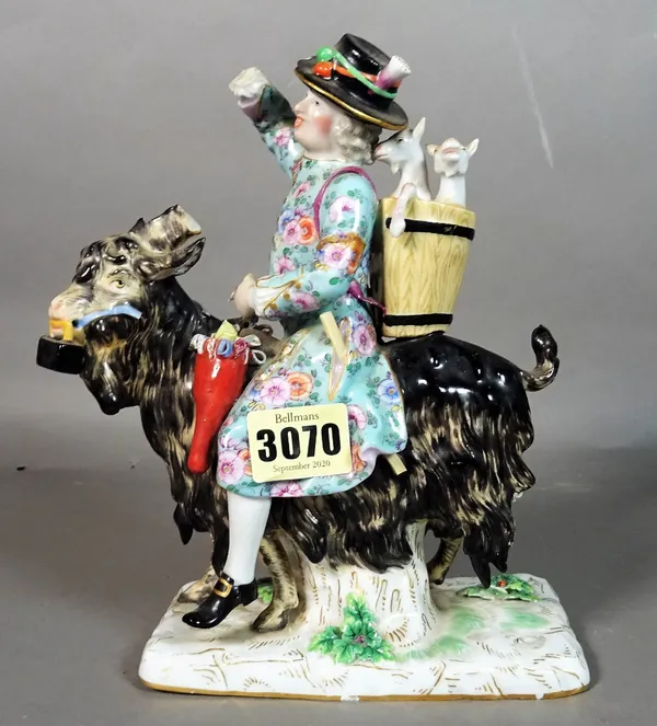 An 18th century Meissen style porcelain figure of a man riding a goat.