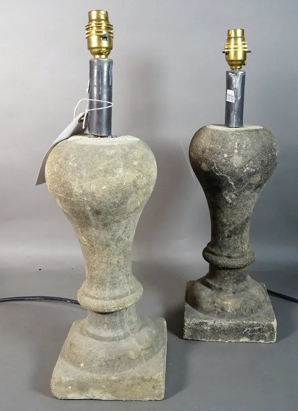 A pair of modern baluster shape reconstituted stone lamps, 47cm high, (2).