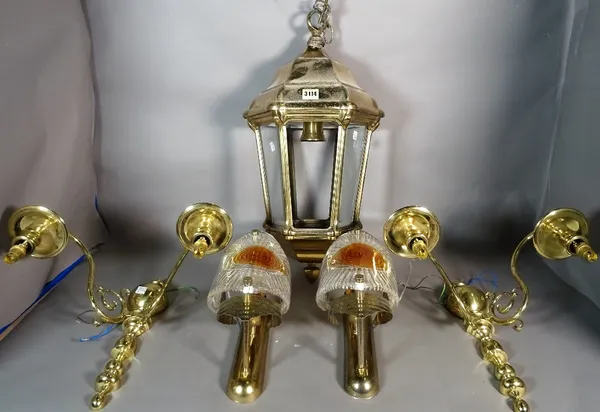 A group of lighting, comprising hexagonal hall lantern, 63cm high, a pair of twin branch wall lights, 38cm high, and a pair of brass and glass wall li