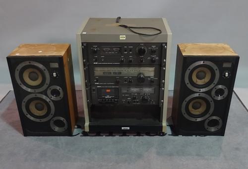 AKAI AM-2450,  a modern hi-fi system, 56cm wide x 72cm high, a pair of WHARFEDALE E THIRTY speakers, 33cm wide x 58cm high.