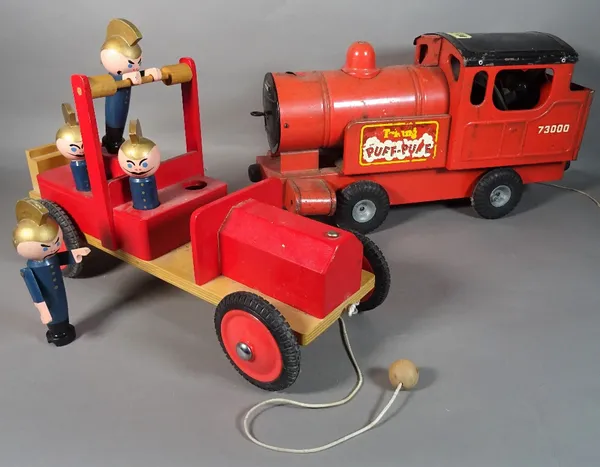 'Tri-ang Puff Puff', an early 20th century train, 41cm wide x 23cm high, and a mid-20th century painted wooden model of a fire truck, 43cm wide x 22cm