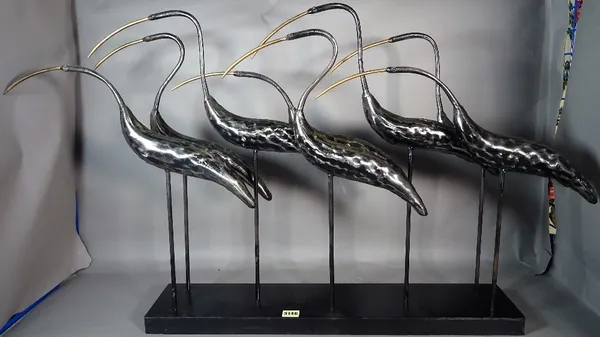 A modern metal sculpture of eight Egrets, 70cm wide x 61cm high.