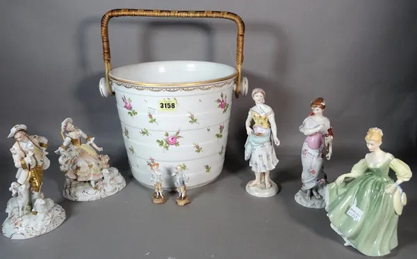 Ceramics; a group of ceramics including Meissen style figures, a Doulton lady figurine and a floral decorated slop bucket.