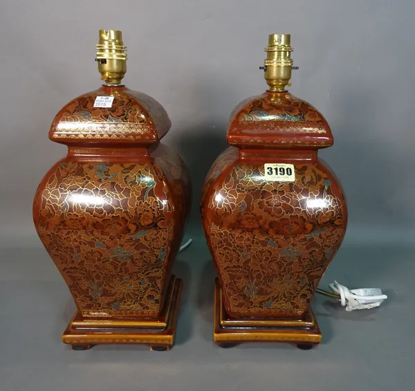 A pair of modern brown glaze baluster table lamps, with foliate decoration, 37cm high, (2).