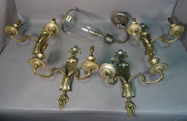 A set of four 19th century brass twin branch wall lights, 31cm wide x 40cm high.