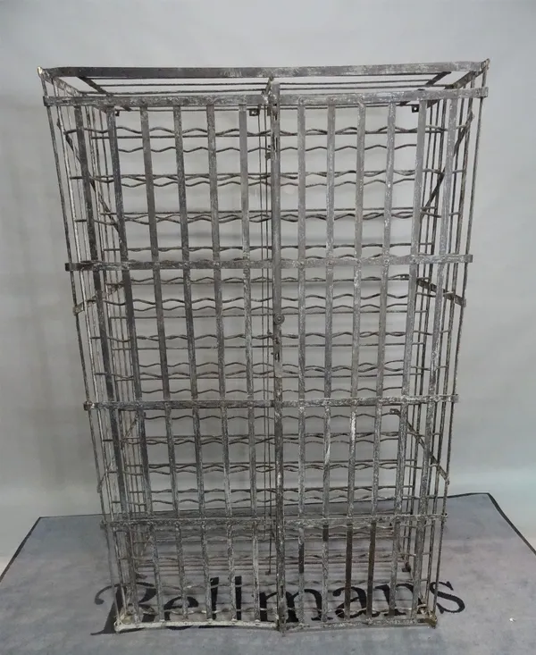 An early 20th century wrought iron fourteen tier wine rack, 103cm wide x 164cm high.