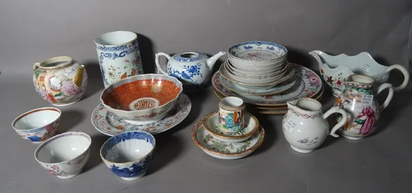 A quantity of Asian ceramics, mostly 18th century Chinese export porcelain, including a blue and white teapot, famille-rose plates, a famille-rose sau