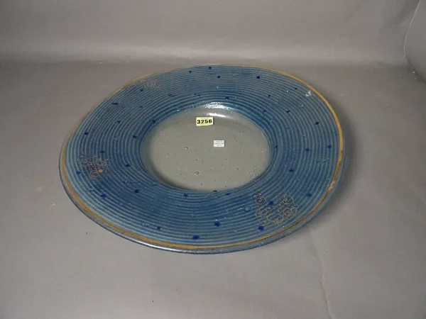 A modern blue glass circular decorative Venetian style plate, 42cm wide.