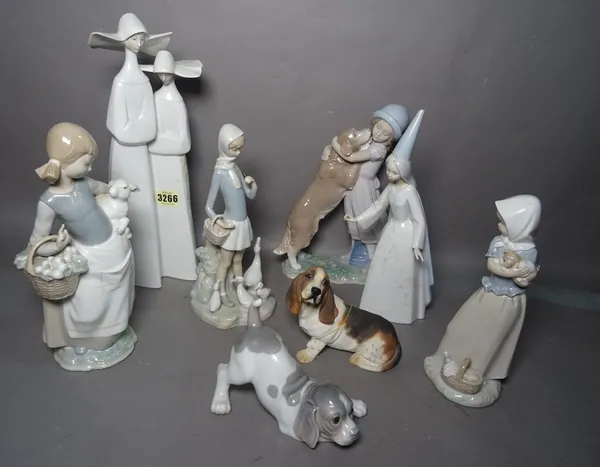 A group of seven Lladro figures (a.f) and a resin Leonardo Collection basset hound (8).