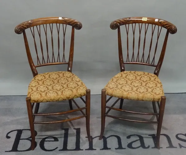 A pair of late 19th century stained beech lattice back occasional chairs on splayed supports, 40cm wide x 76cm high (2)