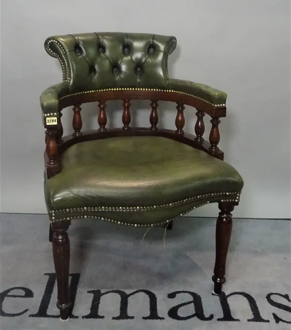 A modern stained beech framed and buttonback upholstered open armchair, 62cm wide x 86cm high.