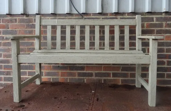 A green painted teak garden bench, with slatted back and seat, 128cm wide x 82cm high.