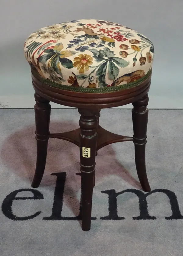 A Victorian rosewood piano stool, 35cm diameter x 51cm high.