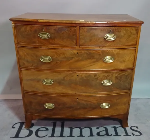 A late George III mahogany bowfront chest, of two short and three long graduated drawers, 103cm wide x 105cm high.