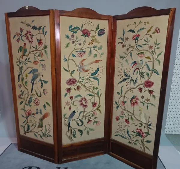 A modern stained beech framed three fold arch screen, decorated with birds of paradise, 178cm high x 192cm wide.