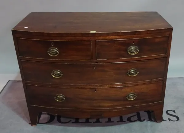 A late George III mahogany bowfront chest, of two short and two long drawers on splayed bracket feet, 105cm wide 82cm high.