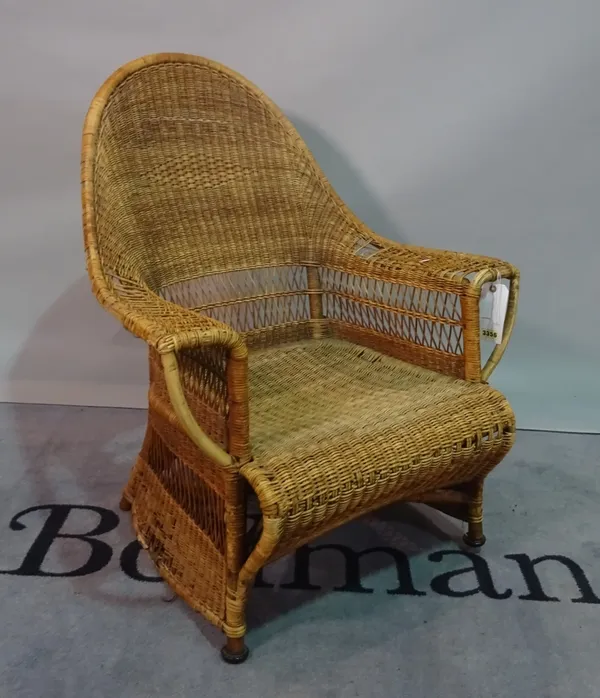 An early 20th century wicker armchair, 73cm wide x 94cm high.