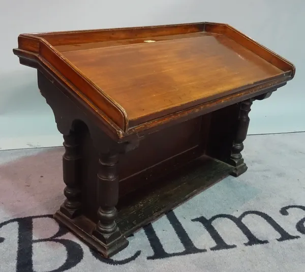 A Victorian mahogany book rest, 80cm wide x 51cm high.