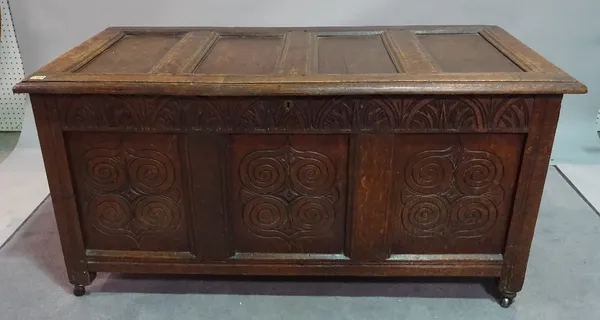 An 18th century and later oak coffer, 131cm wide x 66cm high.