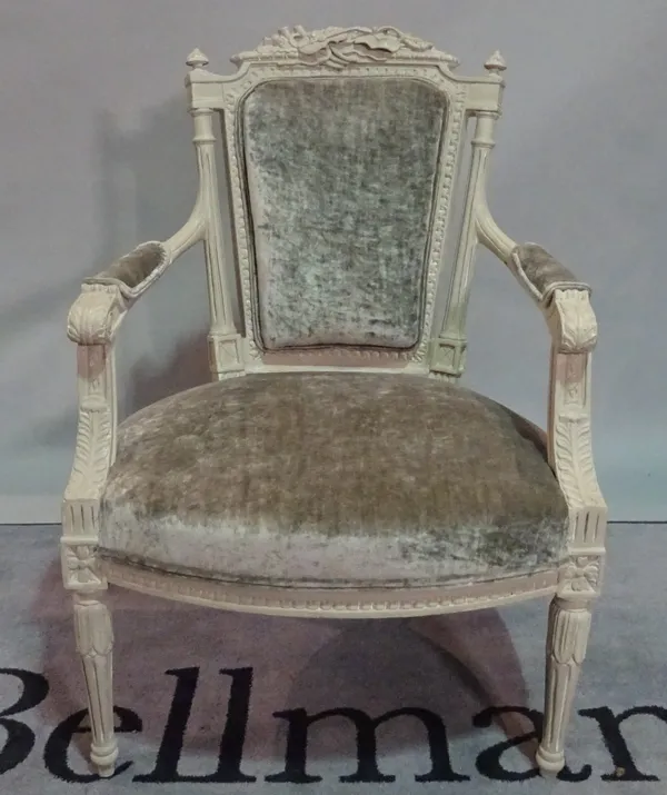 A Louis XVI style grey painted open armchair, on fluted tapering supports, 64cm wide x 94cm high.