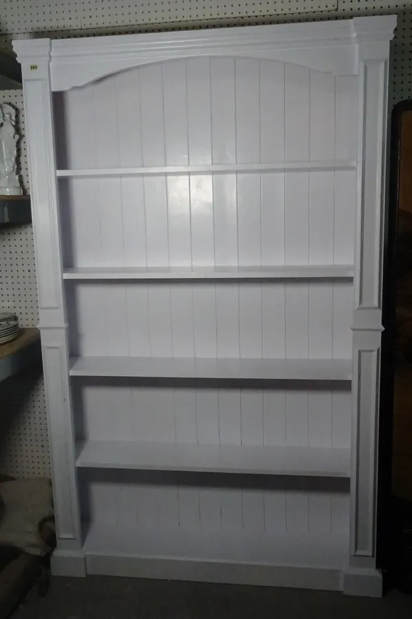 A modern white painted pine floorstanding open bookcase, 120cm wide x 196cm high.