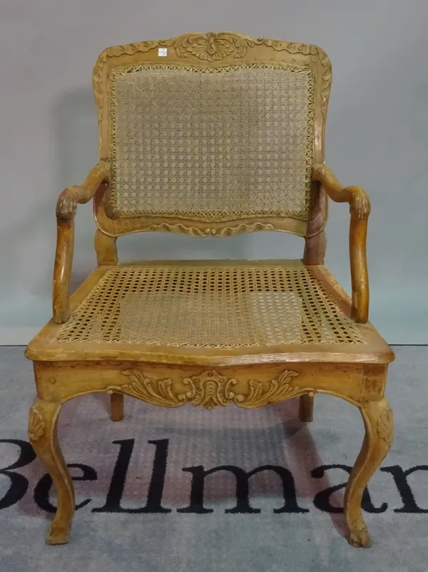 A late 19th century French stained beech open armchair, on cabriole supports, 50cm wide x 90cm high.