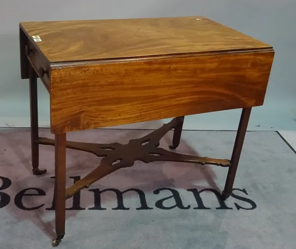 An 18th century mahogany Pembroke table on canted block supports united by 'X' frame stretcher, 81cm wide x 72cm high.