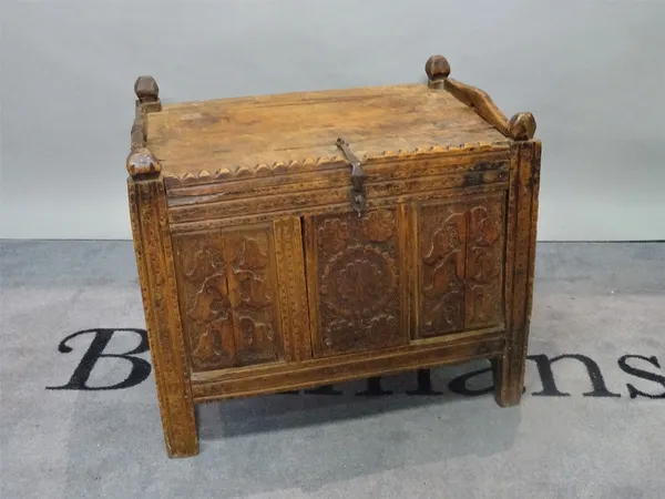 An early 19th century carved hardwood Afghan trunk, 66cm wide x 56cm high.