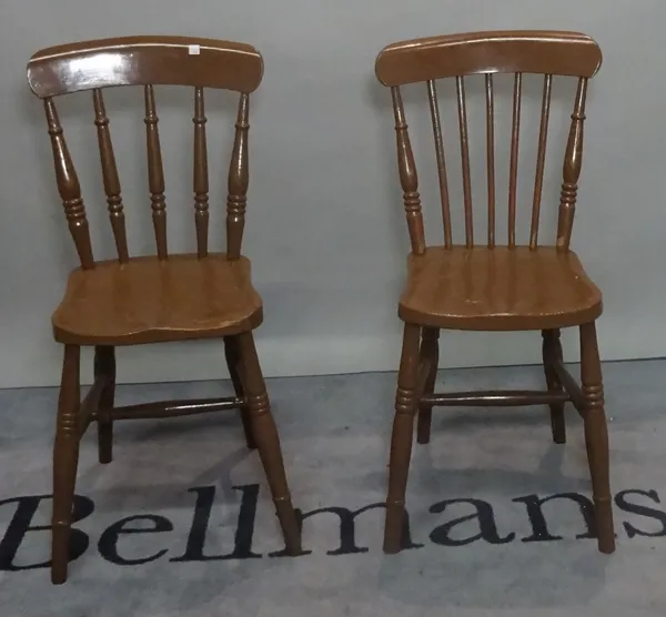 A set of four brown painted stickback dining chairs, 36cm wide x 80cm high, (4).