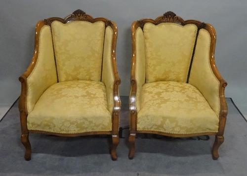 A pair of early 20th century beech framed tub chairs on cabriole supports, 61cm wide x 90cm high, (2).