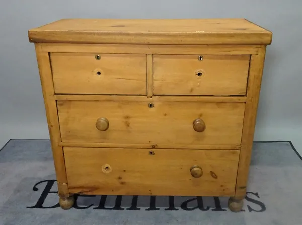 An early 20th century pine chest, of two short and three long drawers, 96cm wide x 81cm high.
