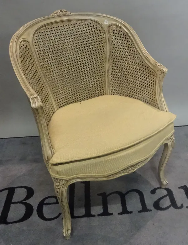 A modern grey painted French tub chair, on cabriole supports, 60cm wide x 87cm high.