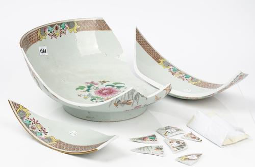 A large Chinese export famille-rose punch bowl, Qianlong, painted on the exterior with pheasants and smaller birds amongst foliage and rockwork, the...