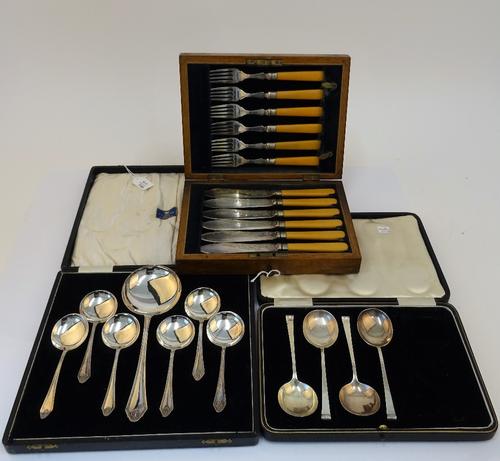 A part set of four silver small soup spoons, Sheffield 1936, weight 131 gms, with a case to hold six spoons and plated wares, comprising; a set of...
