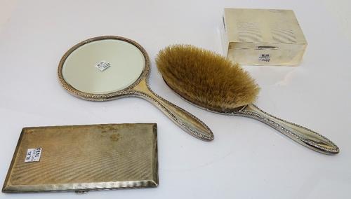 Silver and silver mounted wares, comprising; a rectangular cigarette case with engine turned decoration, London 1938, gross weight 234 gms, a...