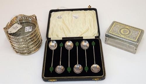 A Victorian silver gilt lidded faceted glass toilet box and cover, having pierced decoration to the lid, London probably 1864, a set of six coffee...