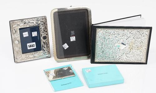 A silver mounted rectangular photograph frame, decorated to record a baby's birth details, size of frame 15.5cm x 13.5cm, a Mexican rectangular...