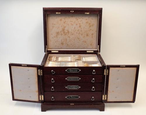 A W.M.F plated canteen of table flatware, comprising; twelve table forks, twelve tablespoons, twelve steel bladed knives, ten teaspoons, twelve fish...