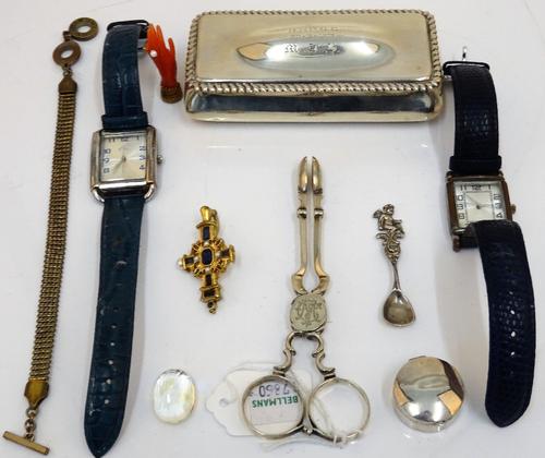 Silver, comprising; a Victorian rectangular hinge lidded box, Birmingham 1896, a pair of sugar nips and a circular small pill box, combined weight...