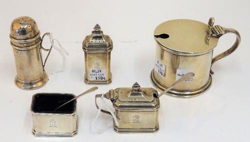 Silver condiments, comprising; a cylindrical mustard pot, London 1928, a three piece condiment set, comprising, a salt, a pepper and a mustard pot,...