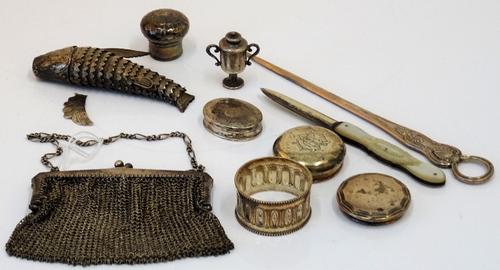 Silver and silver mounted wares, comprising; a lady's chain mesh purse/bag, import mark London 1916, a King's pattern small skewer, a napkin ring, a...
