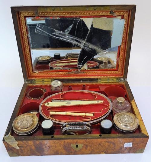 A French silver mounted travelling part toilet/stationary set, mid-19th century, the remaining fittings including an oval dish, various ivory mounted...